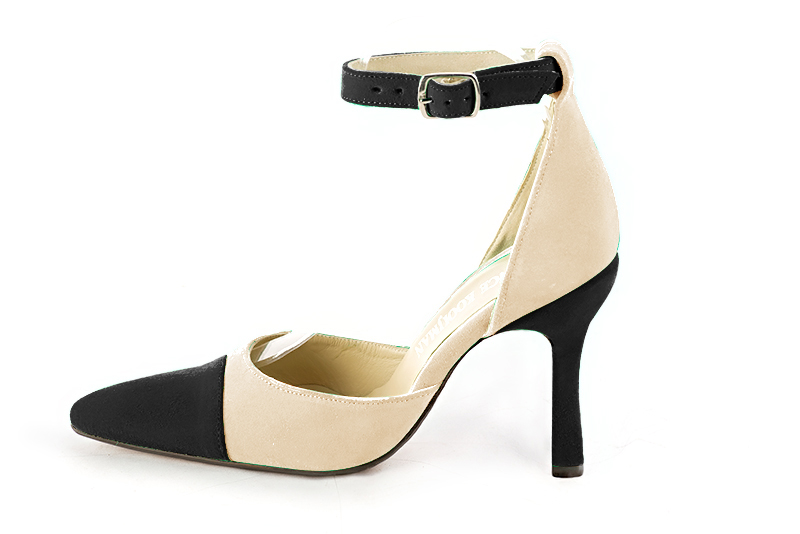Matt black and champagne white women's open side shoes, with a strap around the ankle. Tapered toe. Very high spool heels. Profile view - Florence KOOIJMAN